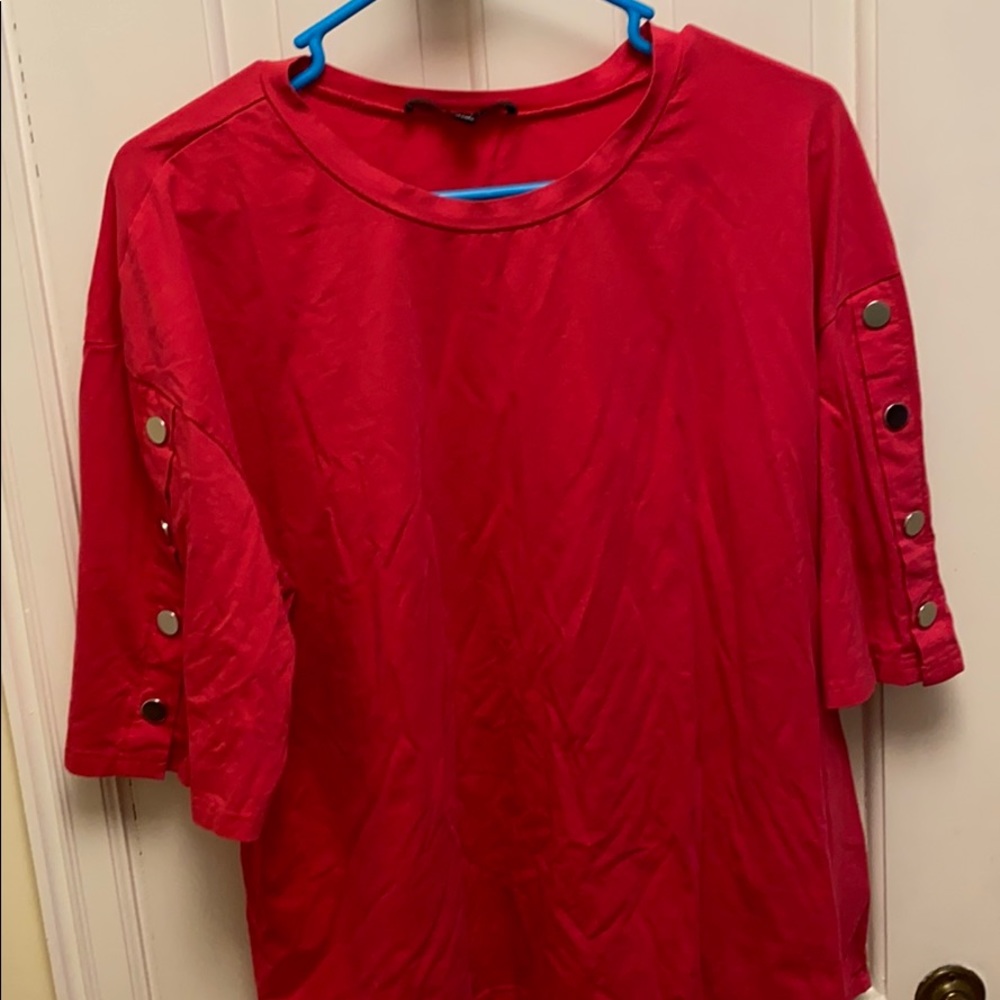 Magenta top with button sleeve detail
